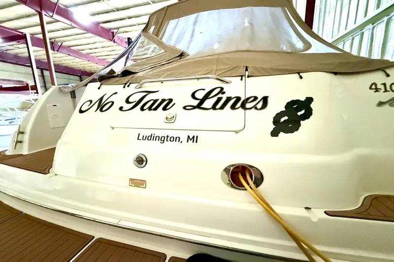 No Tan Lines Yacht Photos Pics 2000 Sea Ray 410 Sundancer boat named "No Tan Lines" docked in Ludington, MI.