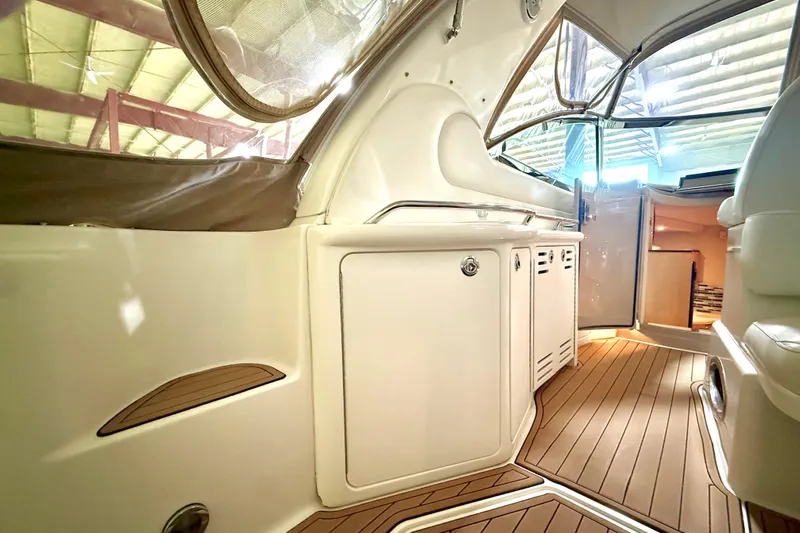 No Tan Lines Yacht Photos Pics Interior view of 2000 Sea Ray 410 Sundancer yacht with sleek design and wood flooring.