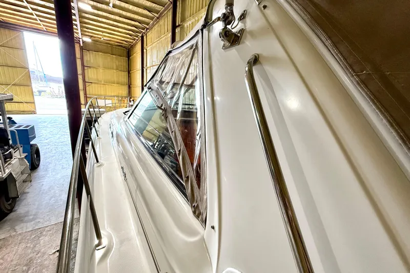 No Tan Lines Yacht Photos Pics 2000 Sea Ray 410 Sundancer yacht in a spacious indoor storage facility.