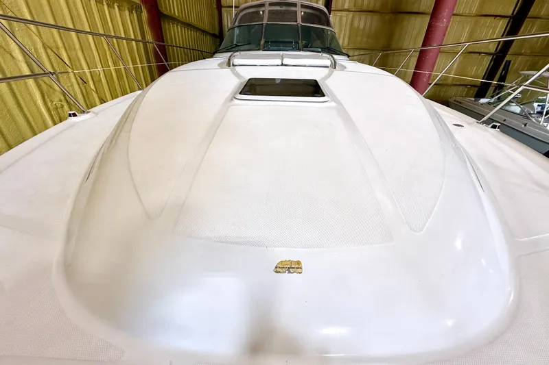 No Tan Lines Yacht Photos Pics 2000 Sea Ray 410 Sundancer yacht, white deck, indoor storage, sleek design.