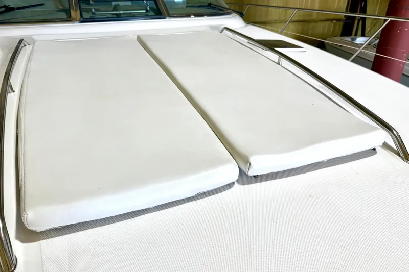 No Tan Lines Yacht Photos Pics Sunpad on 2000 Sea Ray 410 Sundancer yacht, featuring sleek design and stainless steel rails.