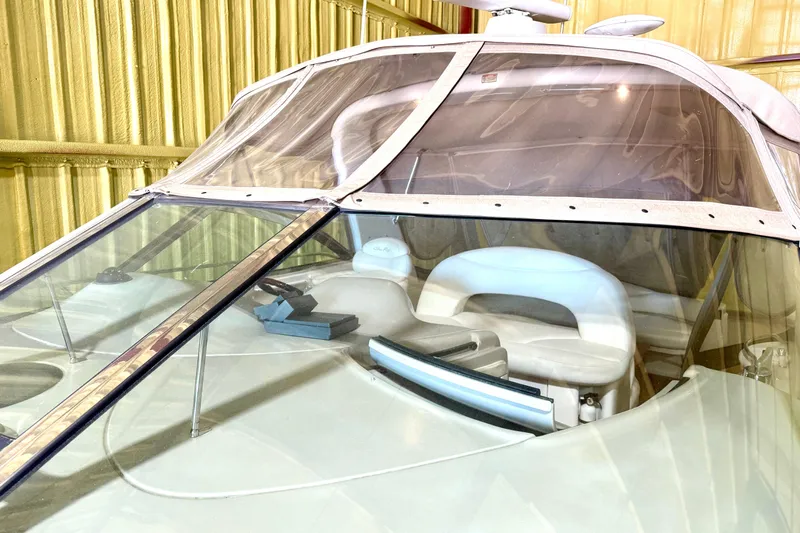 No Tan Lines Yacht Photos Pics 2000 Sea Ray 410 Sundancer boat interior with white seating and clear windshield.