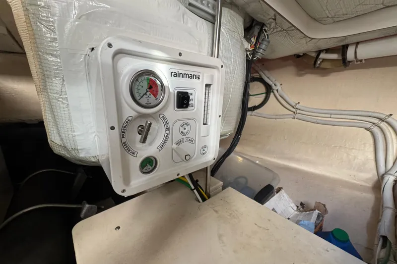  Yacht Photos Pics Control panel in 2016 Tiara Yachts C44 Coupe engine room, featuring gauges and switches.