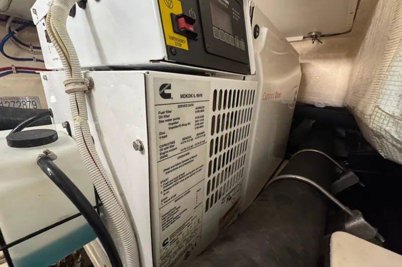  Yacht Photos Pics Engine room of 2016 Tiara Yachts C44 Coupe with Cummins generator.