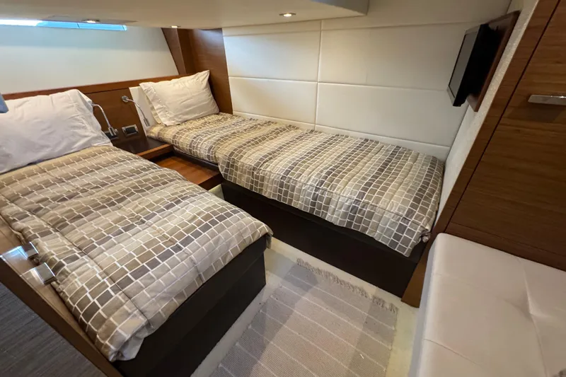 Yacht Photos Pics 2016 Tiara Yachts C44 Coupe cabin with twin beds and modern decor.