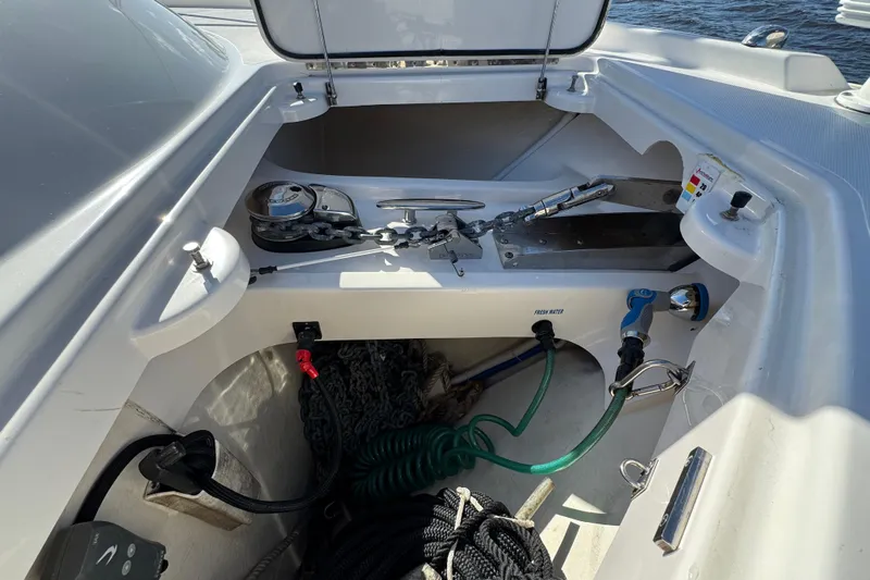  Yacht Photos Pics 2016 Tiara Yachts C44 Coupe anchor locker with chains and hoses.