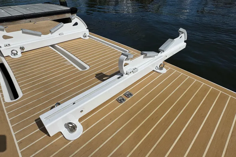  Yacht Photos Pics 2016 Tiara Yachts C44 Coupe swim platform with white mounting brackets.