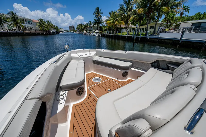  Yacht Photos Pics 2020 Sea Ray SLX 400 boat interior with luxurious seating and scenic waterfront view.