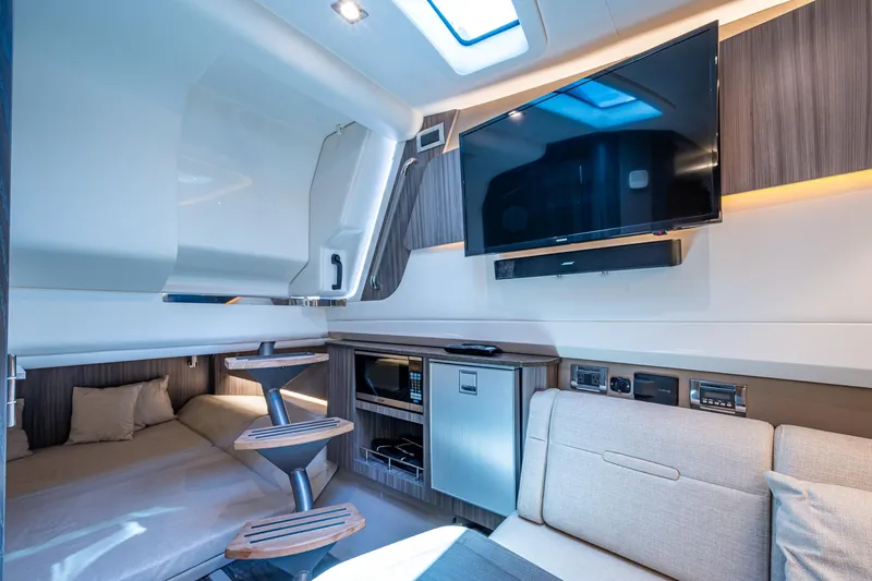  Yacht Photos Pics Luxurious interior of 2020 Sea Ray SLX 400 yacht with modern amenities and sleek design.