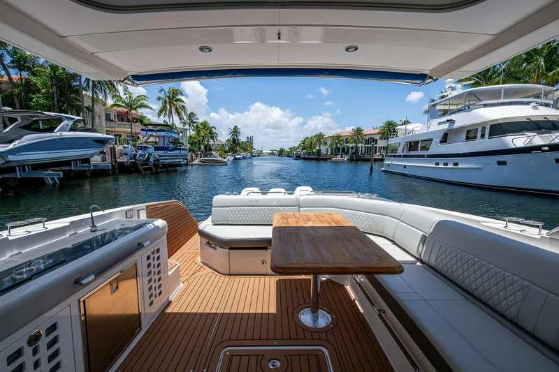  Yacht Photos Pics Luxurious 2020 Sea Ray SLX 400 yacht interior with waterfront view and elegant seating area.