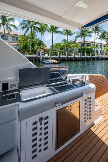  Yacht Photos Pics Outdoor kitchen on 2020 Sea Ray SLX 400 yacht with grill and sink.
