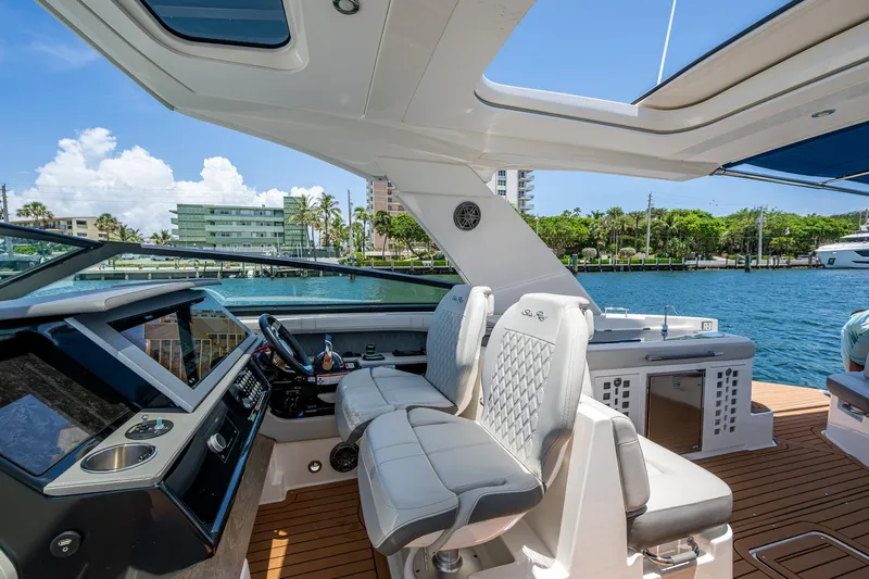  Yacht Photos Pics 2020 Sea Ray SLX 400 boat interior with luxurious seating and modern dashboard.