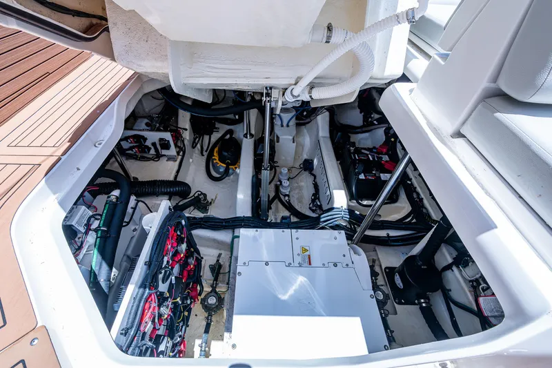 Yacht Photos Pics Engine compartment of 2020 Sea Ray SLX 400, showcasing mechanical components and wiring.