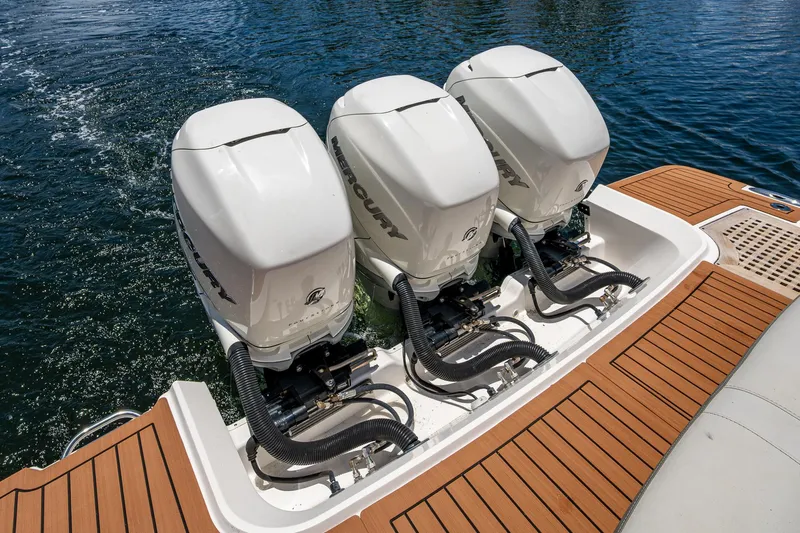 Yacht Photos Pics 2020 Sea Ray SLX 400 with triple Mercury outboard engines on teak deck.