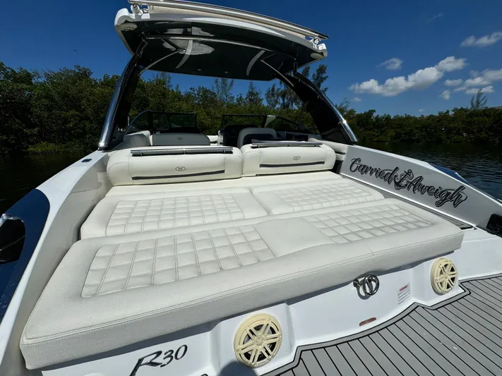  Yacht Photos Pics 2020 Cobalt R30 boat with spacious sun deck and luxurious seating.