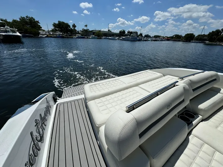  Yacht Photos Pics 2020 Cobalt R30 boat on a sunny day, cruising on a calm lake.