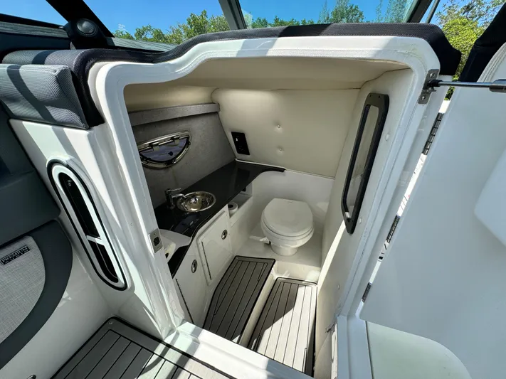  Yacht Photos Pics 2020 Cobalt R30 boat interior bathroom with toilet and sink.