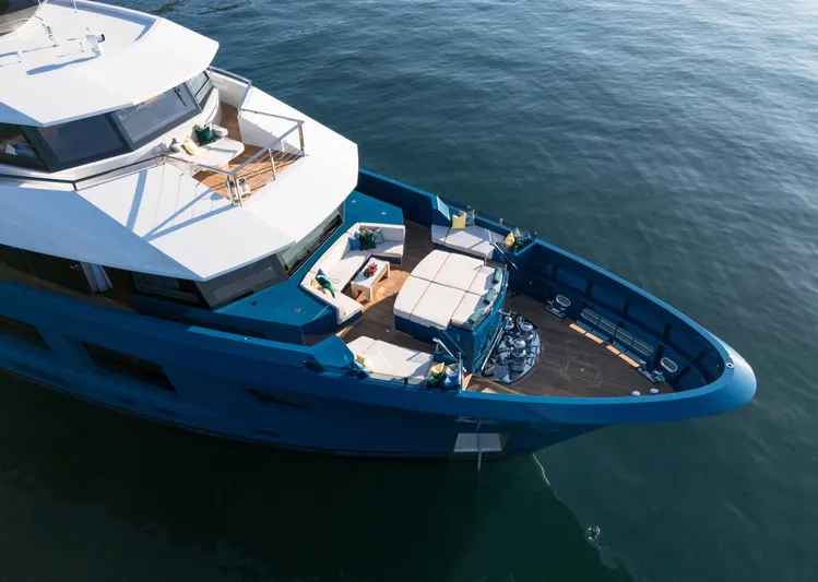 King Benji Yacht Photos Pics Luxurious 2024 Dunya Yachts model, featuring spacious deck and elegant design on calm waters.