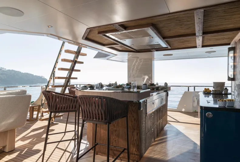 King Benji Yacht Photos Pics Luxurious 2024 Dunya Yachts interior with modern kitchen and ocean view.