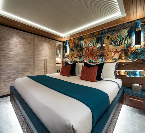 King Benji Yacht Photos Pics Luxurious 2024 Dunya Yachts bedroom with elegant decor and ambient lighting.