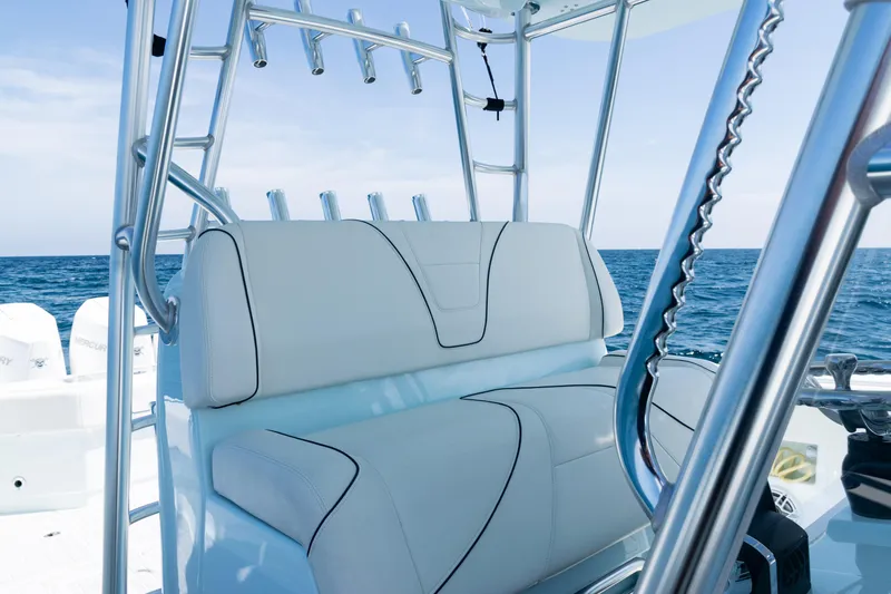  Yacht Photos Pics 2023 SeaVee 390Z boat interior with white seating and ocean backdrop.