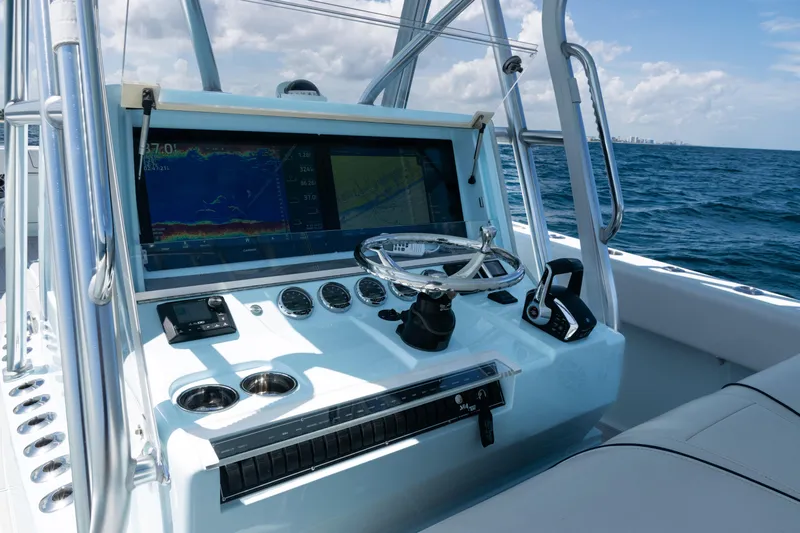  Yacht Photos Pics 2023 SeaVee 390Z boat dashboard with advanced navigation system and ocean view.
