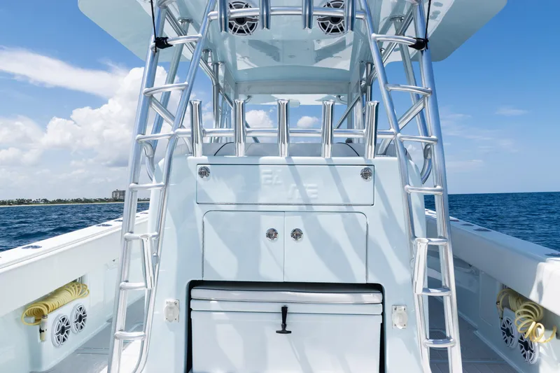  Yacht Photos Pics 2023 SeaVee 390Z boat interior with rod holders and ocean view.