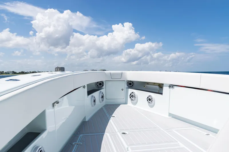  Yacht Photos Pics 2023 SeaVee 390Z boat deck with speakers under a bright blue sky.
