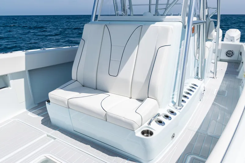  Yacht Photos Pics 2023 SeaVee 390Z boat with sleek white seating and ocean backdrop.