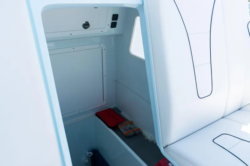  Yacht Photos Pics 2023 SeaVee 390Z boat interior storage compartment with white seating.