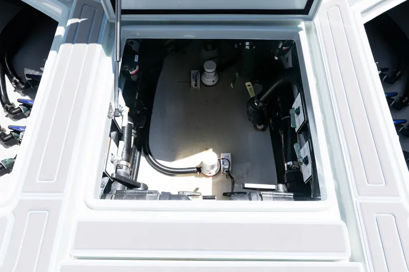  Yacht Photos Pics 2023 SeaVee 390Z boat compartment with visible wiring and plumbing components.