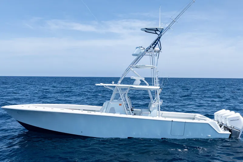  Yacht Photos Pics 2023 SeaVee 390Z boat on open ocean, featuring sleek design and powerful engines.