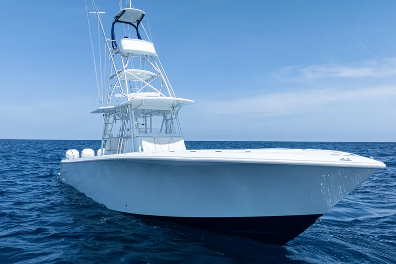  Yacht Photos Pics 2023 SeaVee 390Z boat on open ocean under clear blue sky.