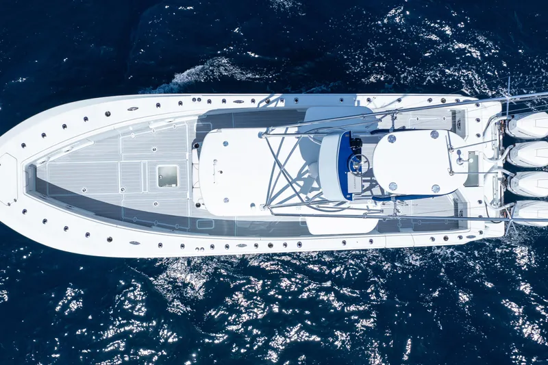  Yacht Photos Pics Aerial view of 2023 SeaVee 390Z boat cruising on deep blue ocean waters.