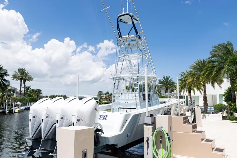  Yacht Photos Pics 2023 SeaVee 390Z boat docked with four powerful outboard engines.