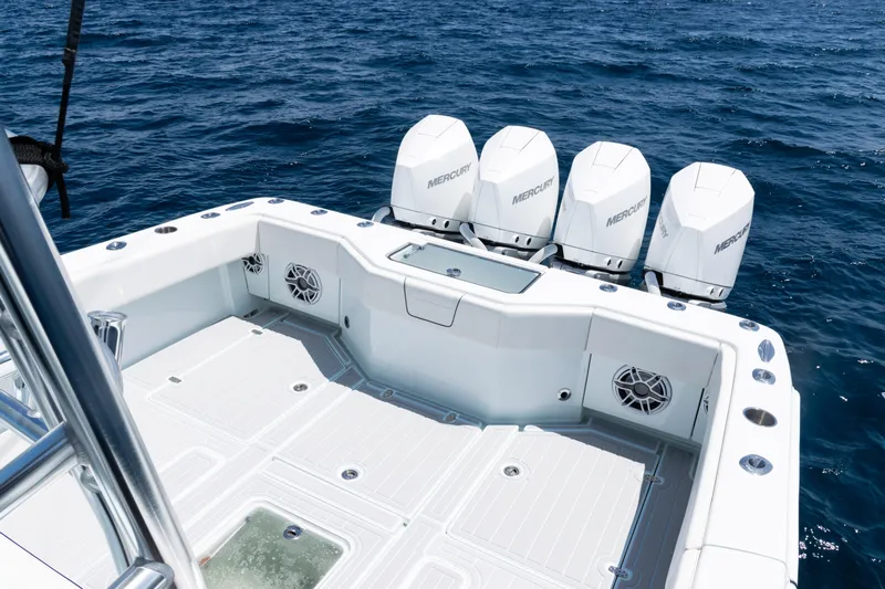  Yacht Photos Pics 2023 SeaVee 390Z boat with four Mercury engines on open ocean.