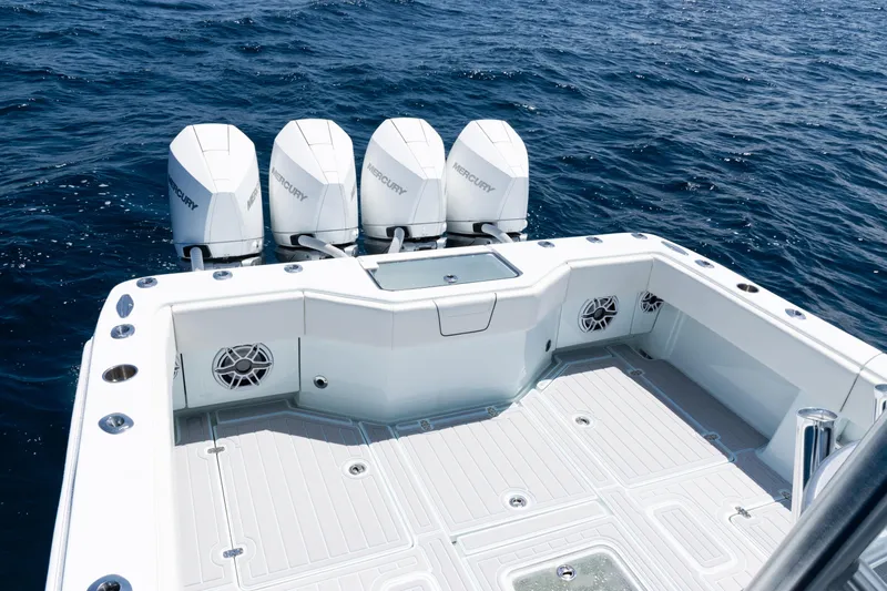  Yacht Photos Pics 2023 SeaVee 390Z boat with four Mercury outboard engines on open water.