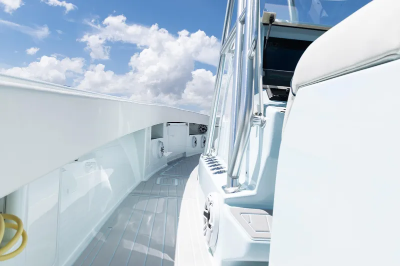  Yacht Photos Pics 2023 SeaVee 390Z boat deck with clear sky and modern design.