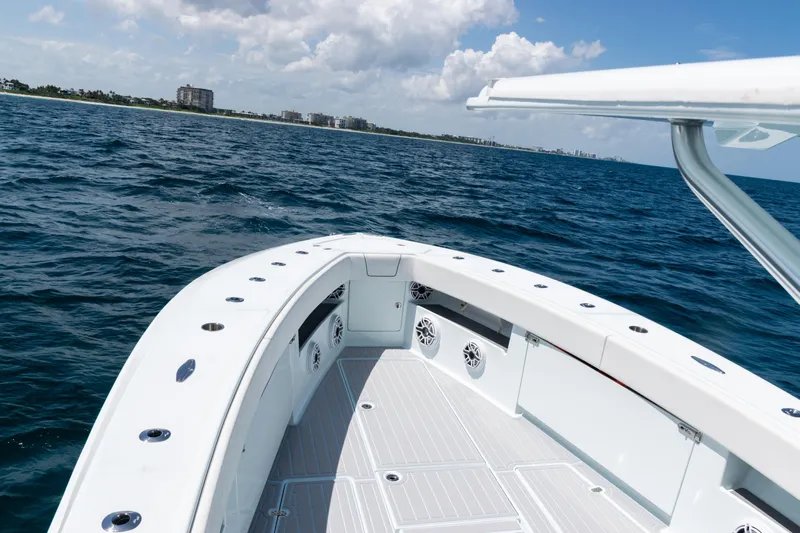  Yacht Photos Pics 2023 SeaVee 390Z boat on open water, showcasing sleek deck design and ocean view.