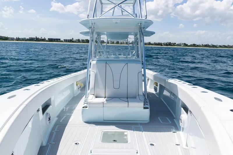  Yacht Photos Pics 2023 SeaVee 390Z boat on open water, featuring sleek design and spacious deck.