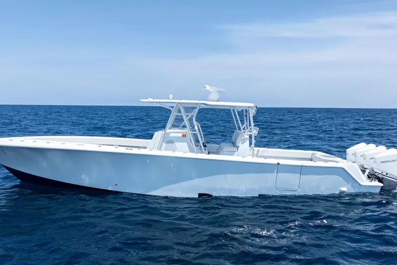  Yacht Photos Pics 2023 SeaVee 390Z boat on open ocean, side view.