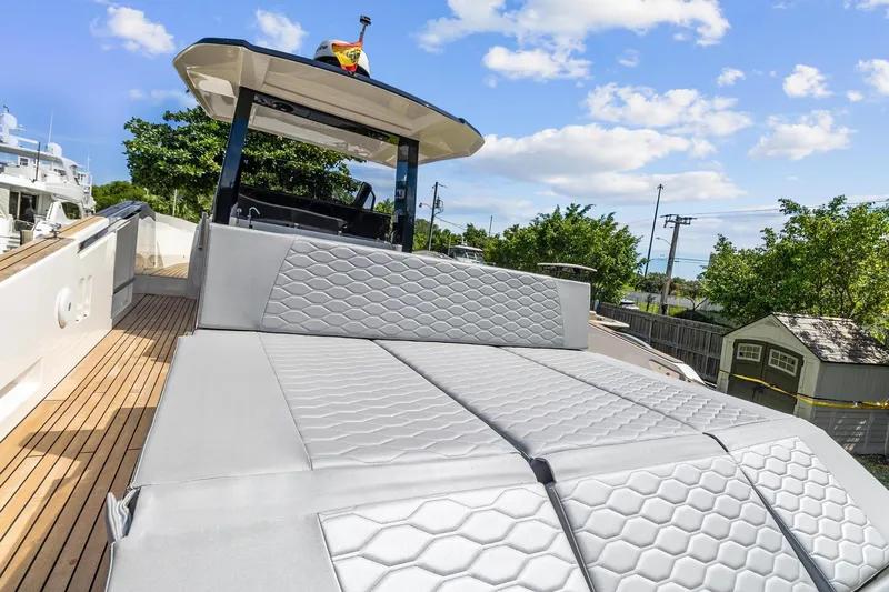  Yacht Photos Pics 2023 Astondoa 377 Coupe Outboard, luxury yacht with spacious sunbathing area and modern design.