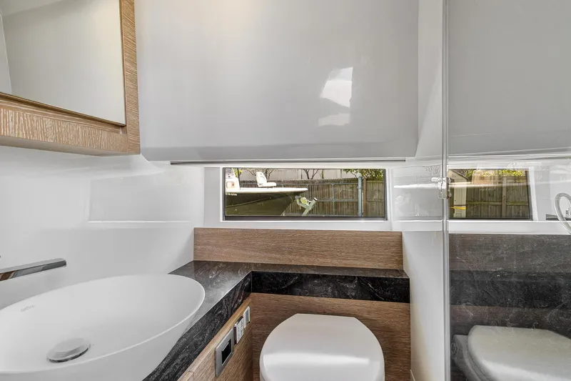  Yacht Photos Pics Modern bathroom interior of 2023 Astondoa 377 Coupe Outboard yacht.