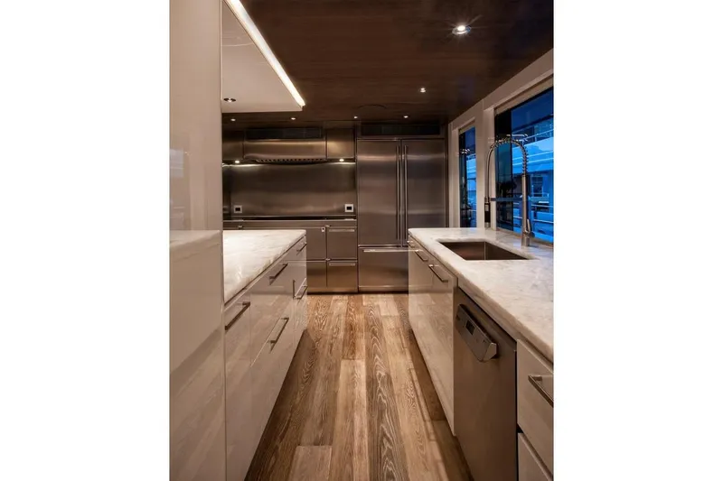 Serenity Yacht Photos Pics Luxurious kitchen interior on 2018 Westport Raised Pilothouse yacht with modern appliances.