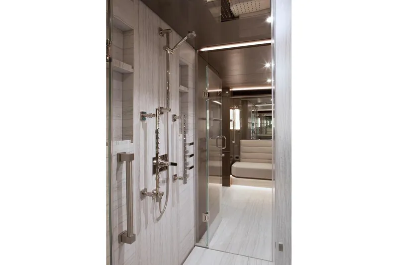 Serenity Yacht Photos Pics Luxurious bathroom interior on 2018 Westport Raised Pilothouse yacht, featuring modern shower design.