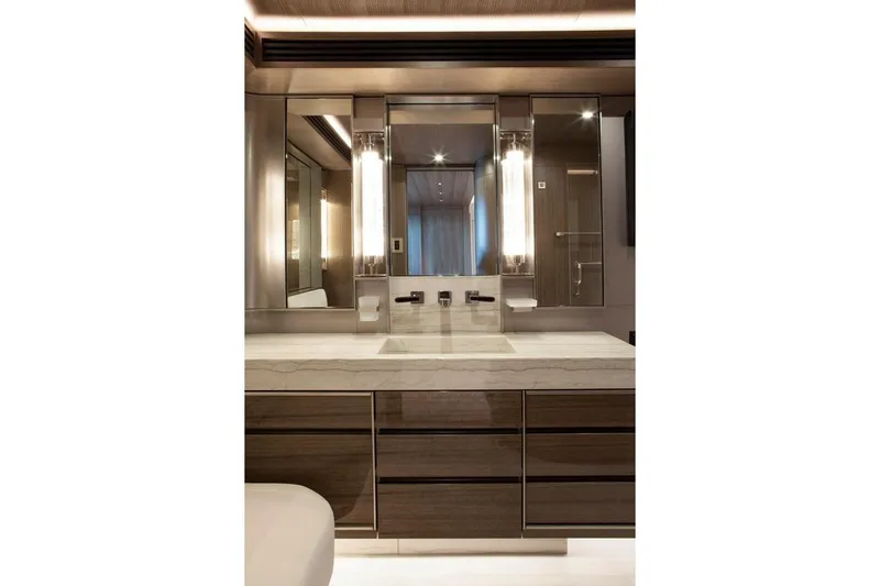 Serenity Yacht Photos Pics Luxurious bathroom vanity in 2018 Westport Raised Pilothouse yacht, featuring modern design elements.