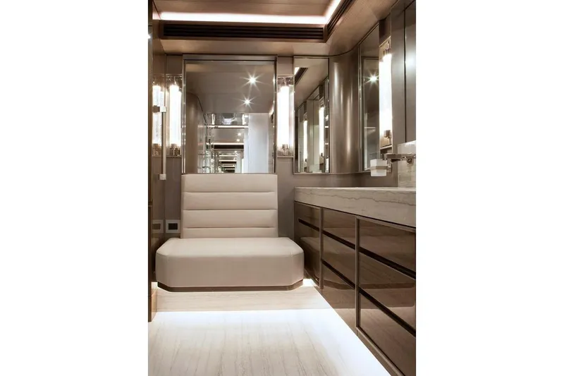 Serenity Yacht Photos Pics Luxurious interior of 2018 Westport Raised Pilothouse yacht with elegant seating and mirrored walls.