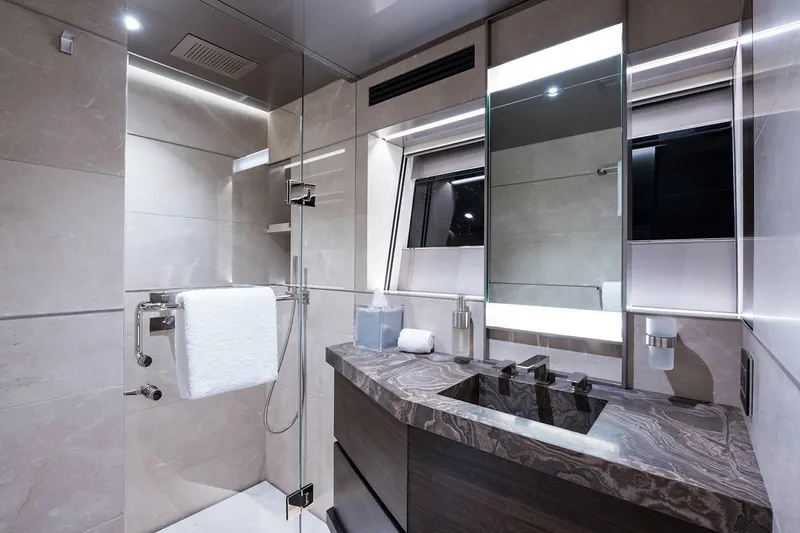 Serenity Yacht Photos Pics Luxurious bathroom in 2018 Westport Raised Pilothouse yacht with modern fixtures and elegant design.
