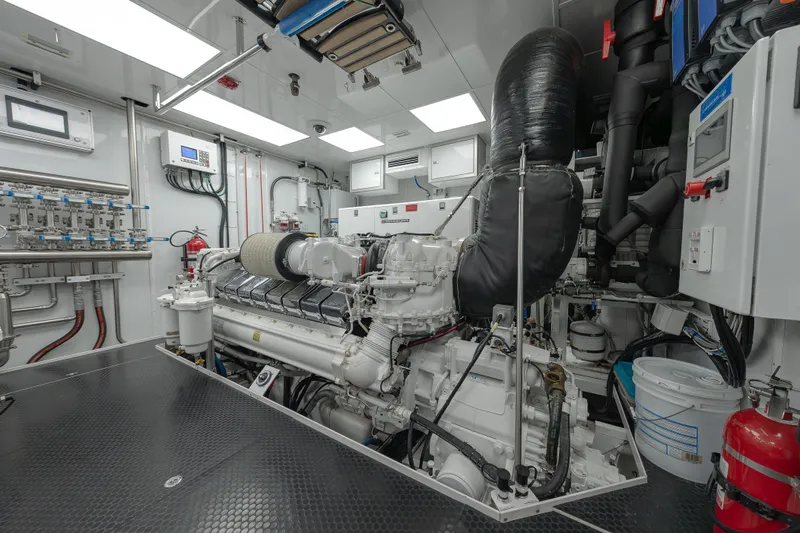 Serenity Yacht Photos Pics Engine room of 2018 Westport Raised Pilothouse yacht, featuring advanced machinery and control systems.