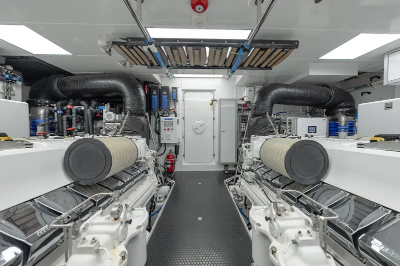 Serenity Yacht Photos Pics Engine room of 2018 Westport Raised Pilothouse yacht, featuring advanced machinery and equipment.